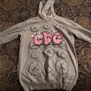 COMME DE GARCONS X KAWS